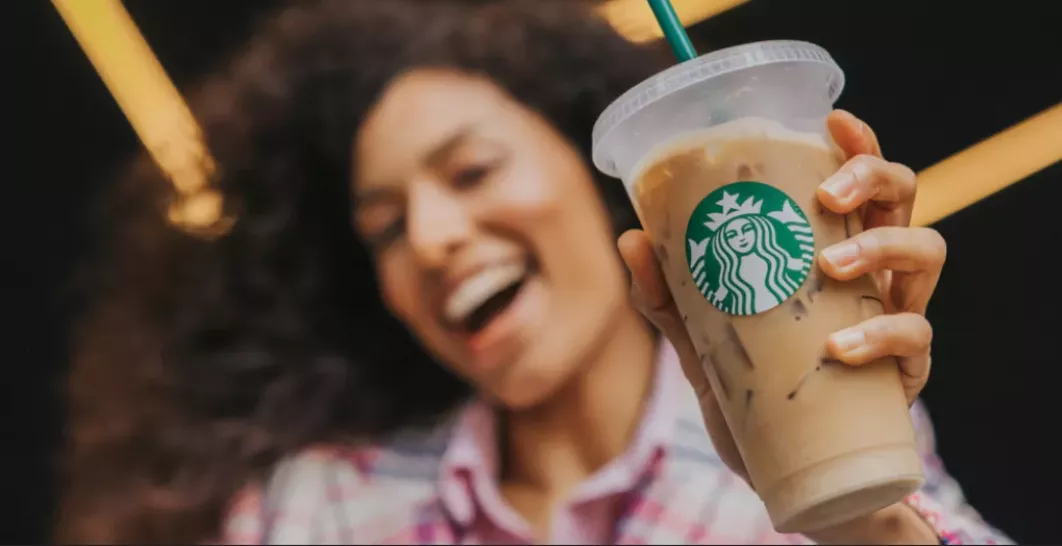 Custom Starbucks drinks with milk, syrup, toppings, and iced coffee ideas